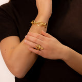 Serpentine gold ring