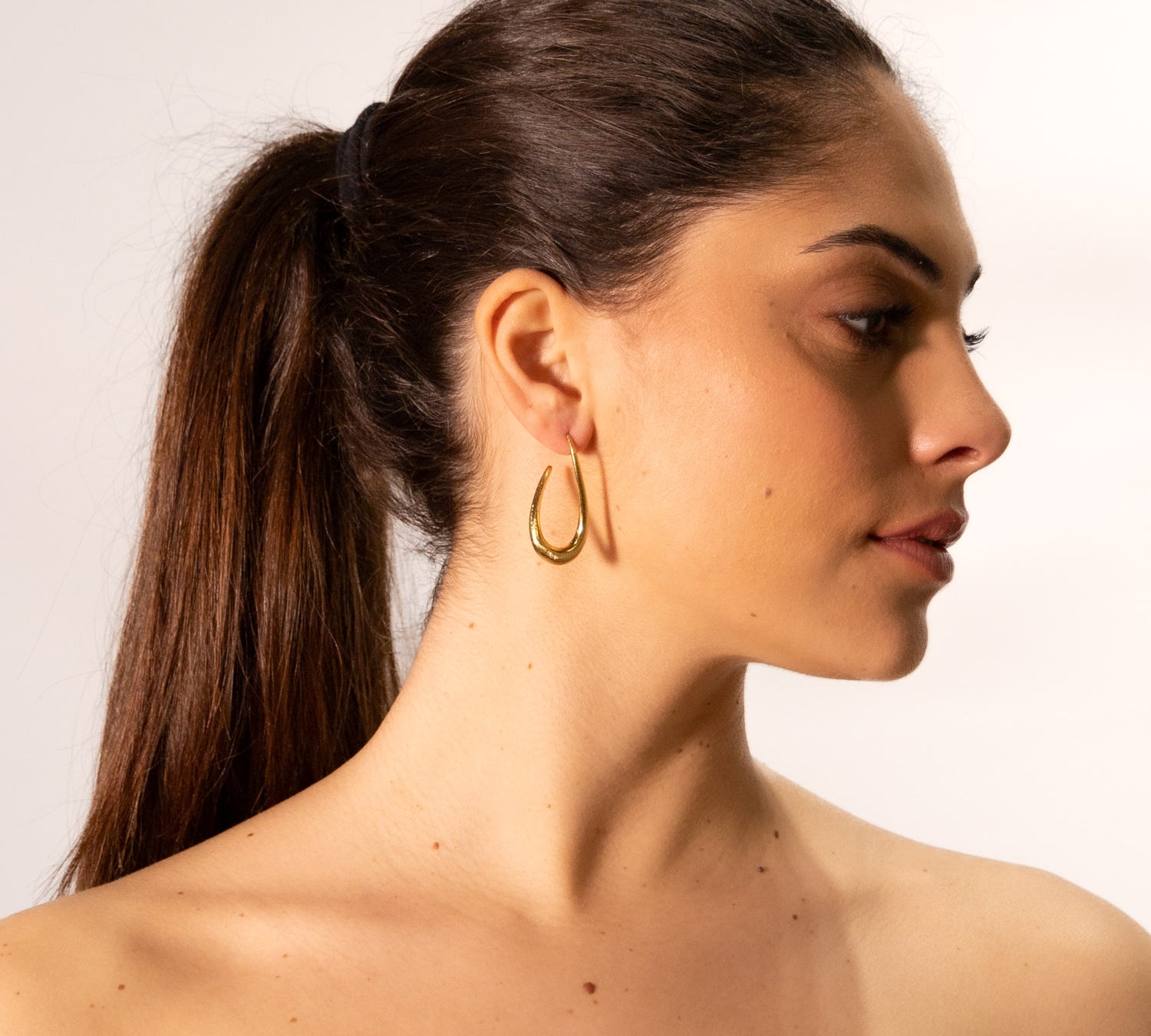 Orecchini uncino stilizzato