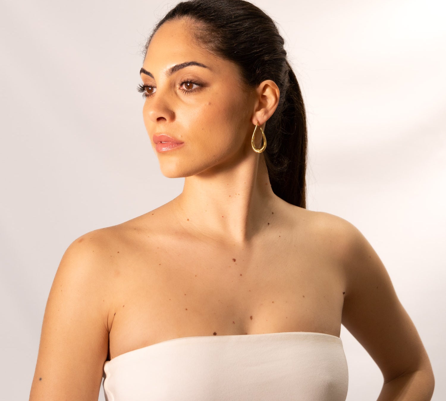 Orecchini uncino stilizzato