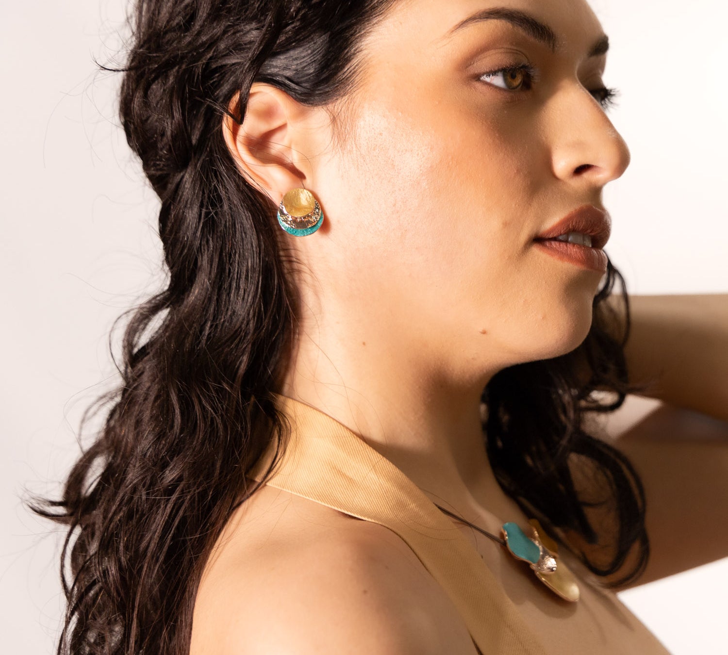 Three overlapping round earrings