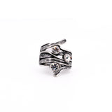 Anello virgole cristalli