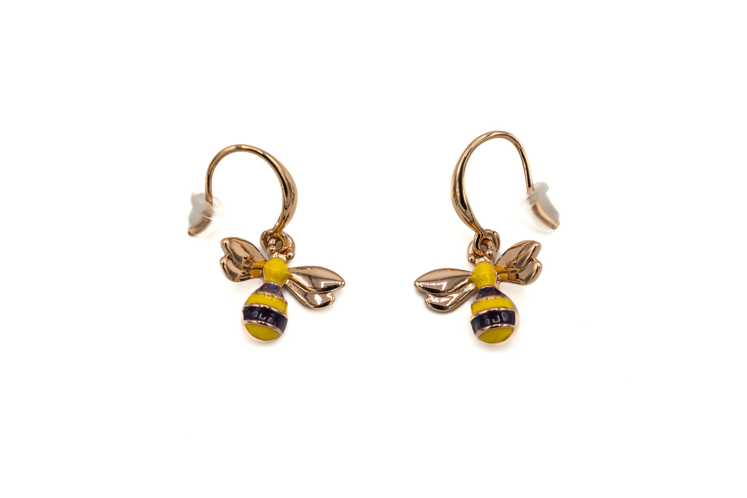 Orecchini pendenti e dipinti a mano.  Altezza: 1,4 cm  Materiale: zama con finitura galvanica in oro rosa  Tonalità smalti: viola, giallo